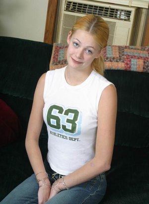 18 year old girl Agnes uncovers her perky tits as she gets completely naked